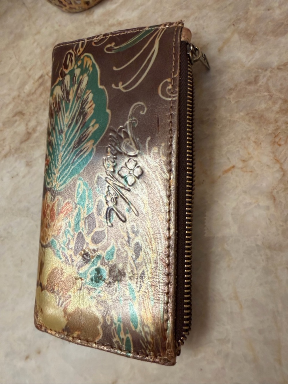 Patricia Nash slim metallic bifold
Wallet - Picture 8 of 10